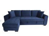 a blue sectional couch with pillows and a foot rest