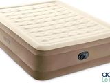 an air mattress with a built in pump attached to it