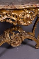 Console en bois sculpté et doré. (photo 3)