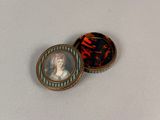 a tortoise shell with a picture of a woman on it
