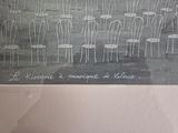 a picture of a black and white picture of a bunch of chairs