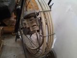 an image of a room with a fan and a cart