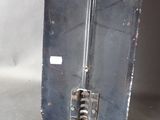 a metal door with a handle and a latch on it