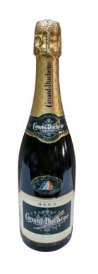 bottle of champagne with a gold cap and label on a white background
