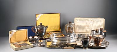 a lot of silver items that are on a table