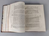 an open book that is sitting on a table