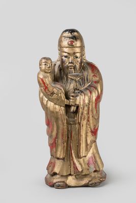 statue of a man holding a baby in his arms