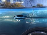 a close up of a car door handle and door handle