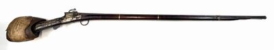 a picture of a wooden pipe with a wooden handle