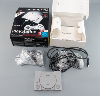 une boîte blanche contenant une manette de jeu
