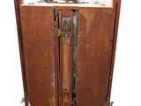 an old wooden cabinet with a door open on a white background