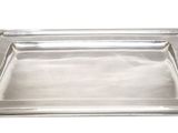 a close up of a metal tray on a white background