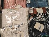 a box full of clothes that are sitting on top of a table