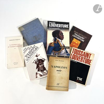 many books that are sitting on a table