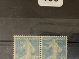 deux timbres avec la photo d'un homme et d'une femme
