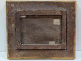 an old wooden picture frame with a picture of a dog in it