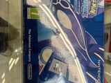someone is holding a nintendo wii game in their hand in a store
