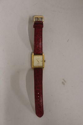 an image of a wrist watch on a white surface