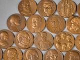 a lot of coins that are sitting on a table