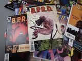 a lot of comic books on the table together