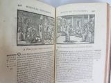 an open book with a picture of people in it