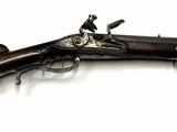 a gun that is sitting on a table