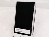 a white cell phone with a barcode on it