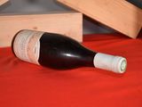 a bottle of wine that is sitting on a table