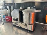 an image of a commercial mixer in a kitchen
