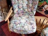 a chair and a chair that are sitting in a room