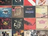 a lot of vinyl records on the floor