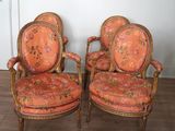 pair of orange upholstered chairs with floral upholstered upholstered upholstered upholstered upholstered upholstered upholstered uphol