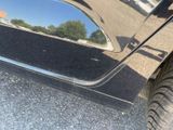 a reflection of a car in the side mirror of a car