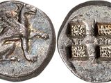 a close up of a coin with an image of a horse on it