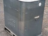 a metal box with a yellow sign on top of it