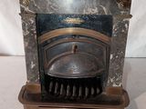 un poêle à l'ancienne avec une casserole posée dessus
