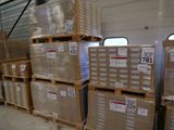 a lot of boxes stacked on top of each other in a warehouse