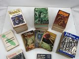 a lot of books that are sitting on a table