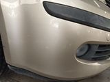 a close up of the front bumper of a car
