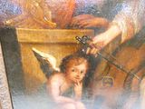un tableau représentant un ange jouant du violon avec un enfant