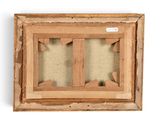 an old picture frame with a picture of two people in it