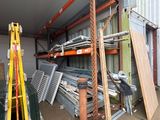 a lot of different types of metal items in a warehouse