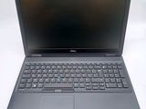 the dell laptop is open and ready to be used