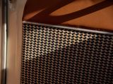 a close up view of a door with a window sill in the background