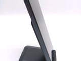 a cell phone that is sitting on a stand