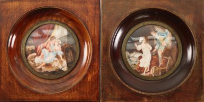 two framed pictures of a woman and a child in a wood frame