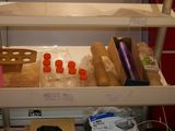 a shelf with various items on it in a room