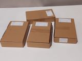 four boxes of different sizes and sizes are sitting on a table