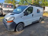 a white van that is parked in a lot