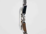 an image of a close up of a wrist watch on a white surface